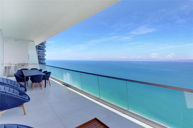 balcony featuring a water view