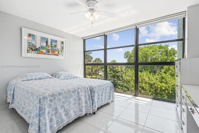 bedroom with light tile flooring and ceiling fan