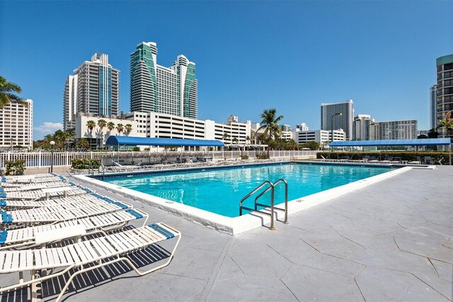 view of pool featuring a patio