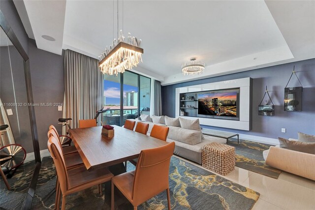 tiled dining area with a chandelier