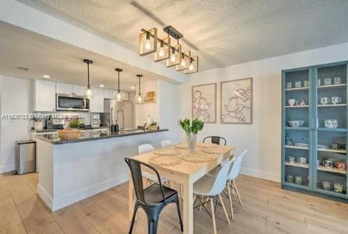 dining area featuring light hardwood / wood-style flooring