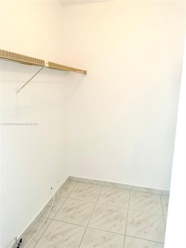 washroom featuring tile flooring