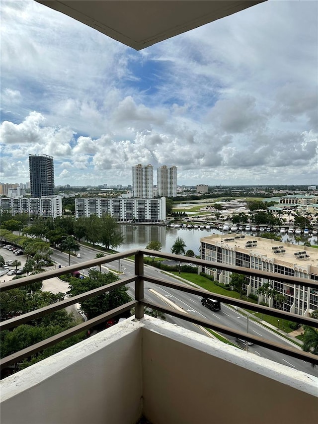 balcony featuring a water view