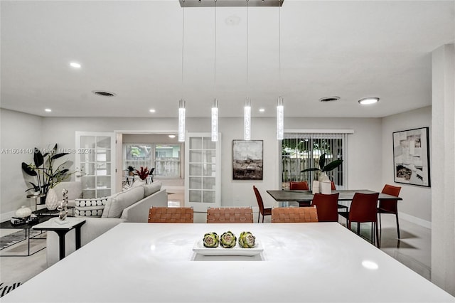 dining area featuring plenty of natural light