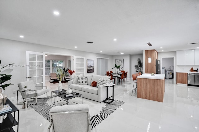 living room with light tile patterned floors