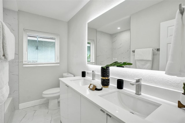 full bathroom with shower / washtub combination, vanity, and toilet