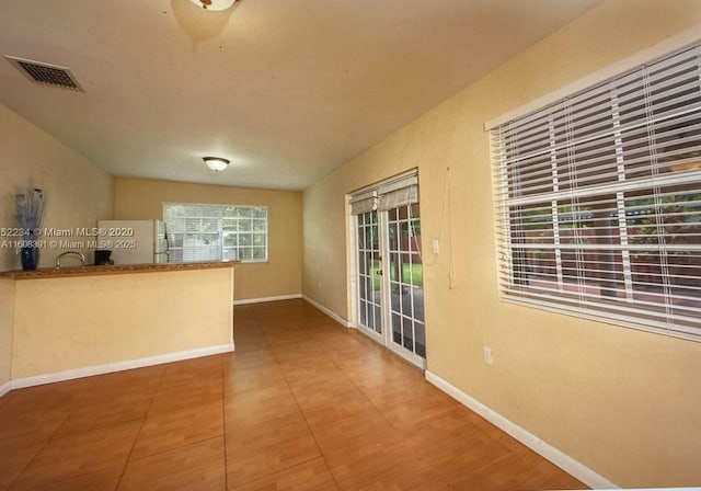 interior space with white fridge