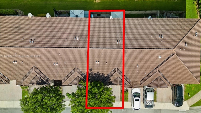 view of front of property with a balcony and a garage