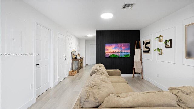 living room with light hardwood / wood-style floors