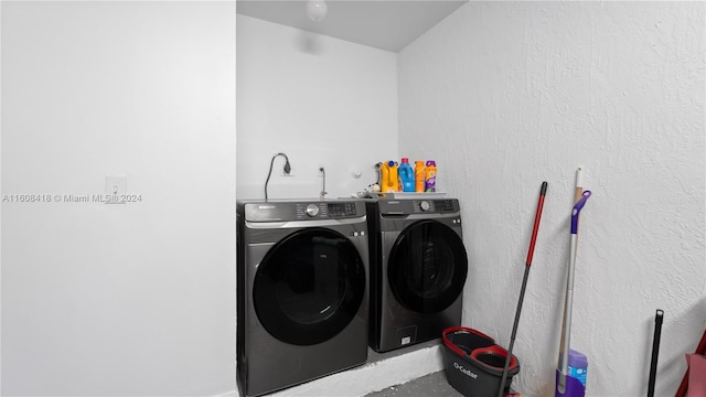 laundry room with separate washer and dryer