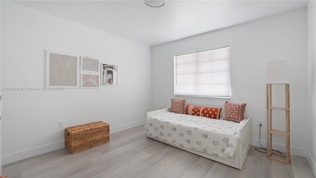 bedroom featuring light wood-type flooring