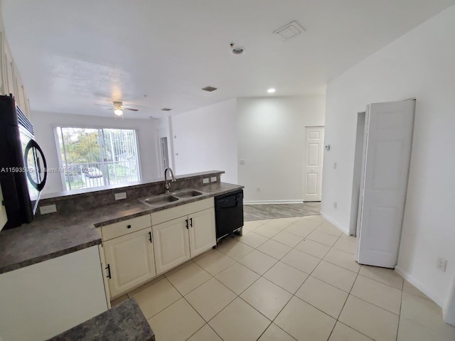 kitchen with light tile patterned floors, ceiling fan, black appliances, and sink