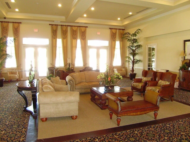 living room featuring beamed ceiling, a towering ceiling, carpet floors, and ornamental molding