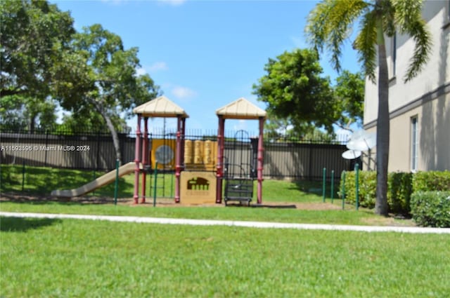 view of play area featuring a yard