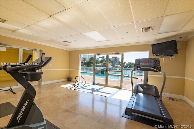 exercise room with a drop ceiling