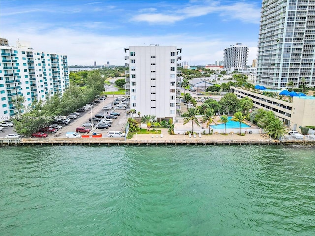 birds eye view of property featuring a water view