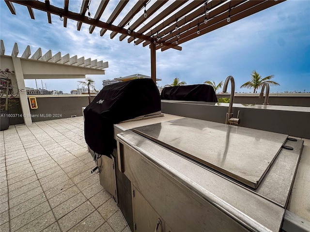 view of patio / terrace featuring a pergola