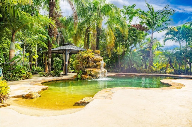 surrounding community featuring a gazebo and a patio area