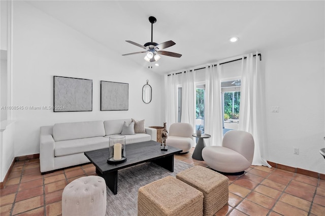 living room featuring vaulted ceiling, tile flooring, and ceiling fan