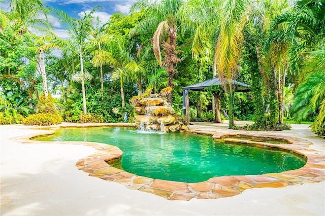 view of swimming pool featuring a gazebo