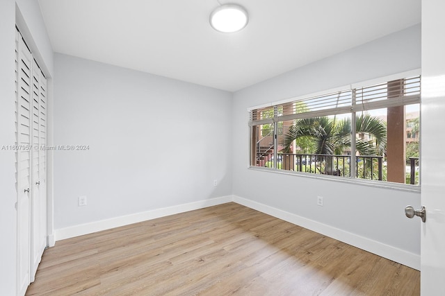 interior space featuring light hardwood / wood-style flooring and a wealth of natural light