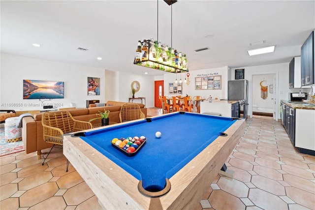 game room with light tile patterned floors and billiards