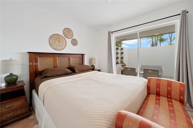 tiled bedroom with access to exterior