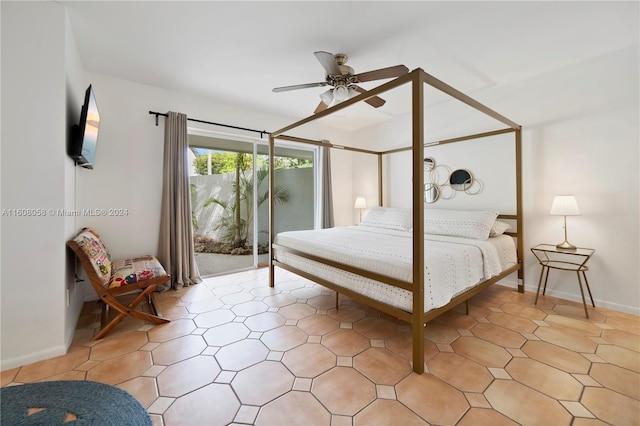 bedroom featuring ceiling fan and access to exterior