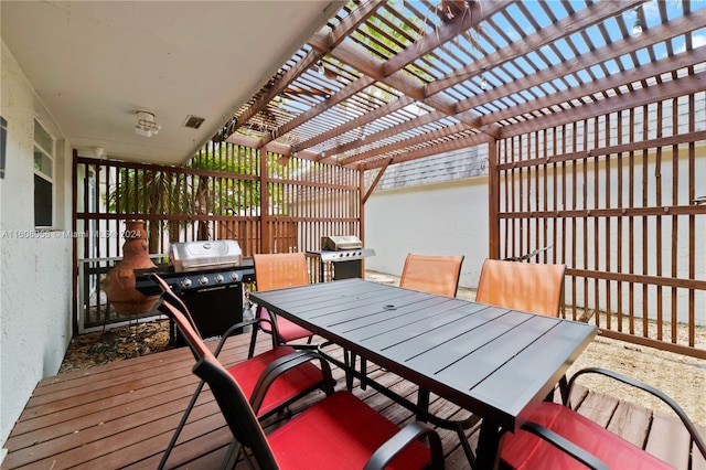 wooden terrace featuring a pergola and grilling area