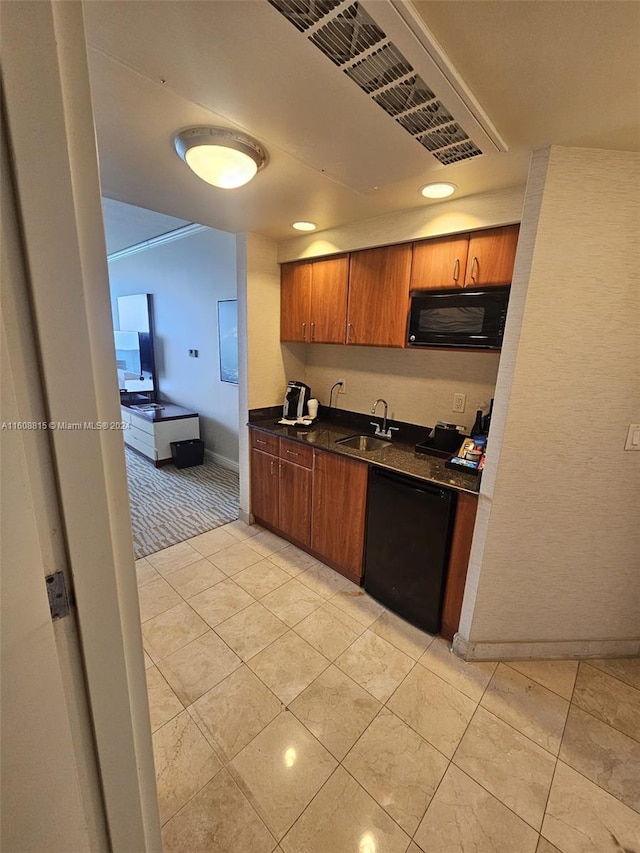 kitchen featuring black appliances, ornamental molding, sink, and light tile patterned floors