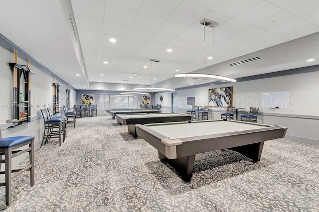 recreation room with light carpet and pool table