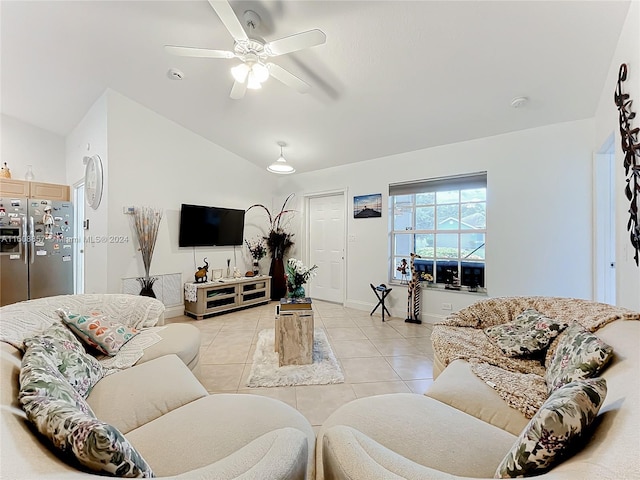 tiled living room with ceiling fan and vaulted ceiling