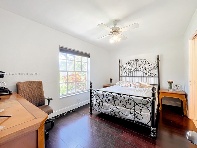 bedroom featuring ceiling fan and dark hardwood / wood-style flooring