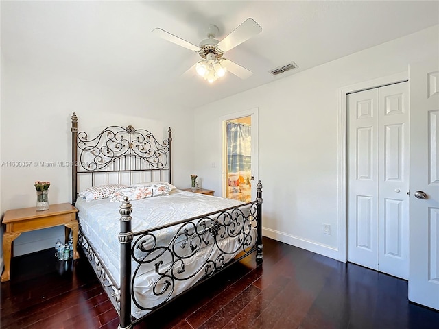 bedroom featuring ceiling fan, a closet, and hardwood / wood-style floors