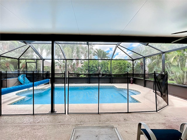 view of pool featuring a patio area and a lanai