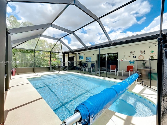 view of pool featuring a lanai and a patio area