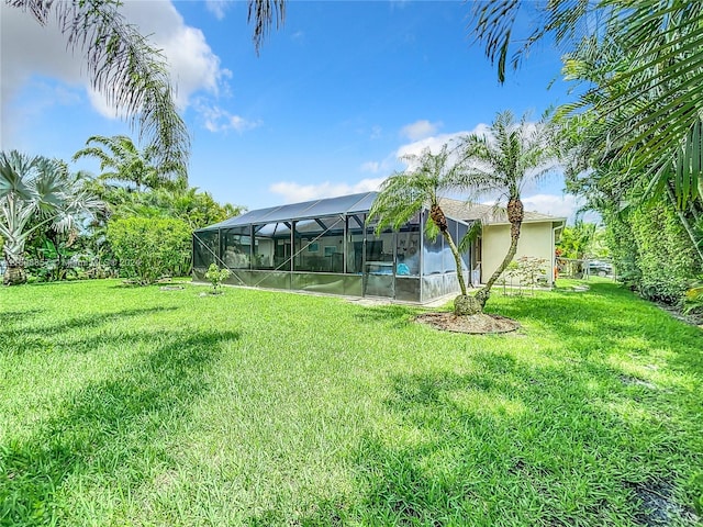 view of yard featuring a lanai