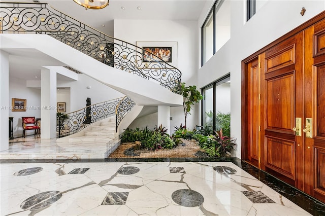 entryway featuring a high ceiling