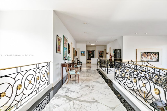 hallway with light tile patterned floors