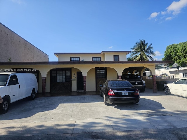 view of front of house with a carport