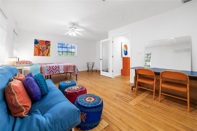 interior space featuring light wood-type flooring and ceiling fan