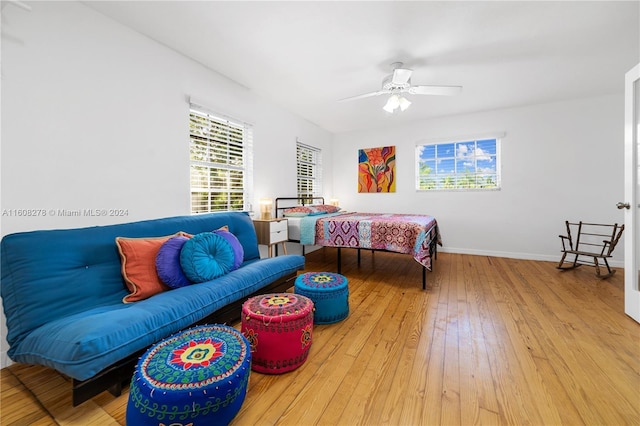 bedroom featuring ceiling fan and wood-type flooring