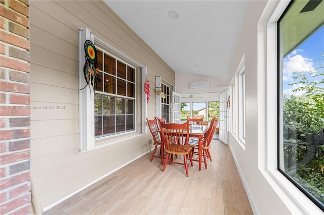 sunroom with lofted ceiling