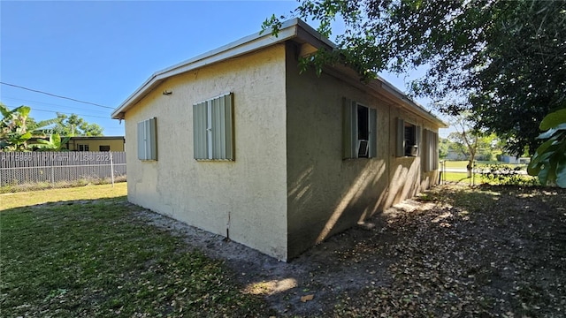 view of property exterior featuring a yard