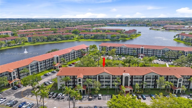 drone / aerial view featuring a water view