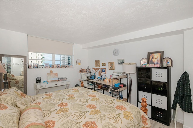 bedroom featuring a textured ceiling