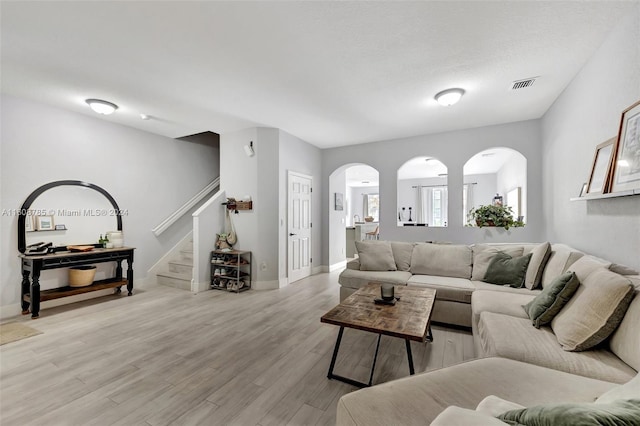 living room with light hardwood / wood-style floors