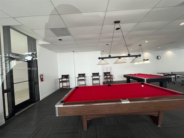 rec room with a drop ceiling, dark colored carpet, and billiards