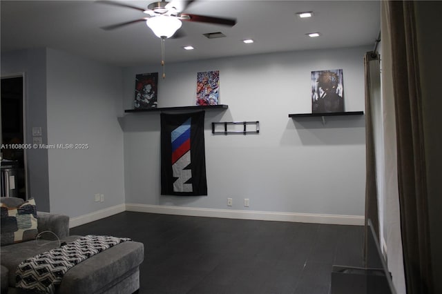 living room featuring ceiling fan