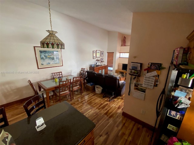 dining room featuring dark hardwood / wood-style flooring